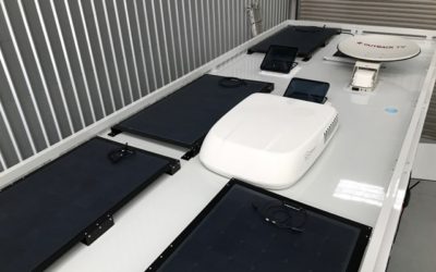 The roof of the Planetcruiser 6.200 has been fitted off with, 800 watts of solar panels , 2 exhaust fans , Outbound Motorhome Products roof window , satellite TV dish and an Ibis 3 air conditioner